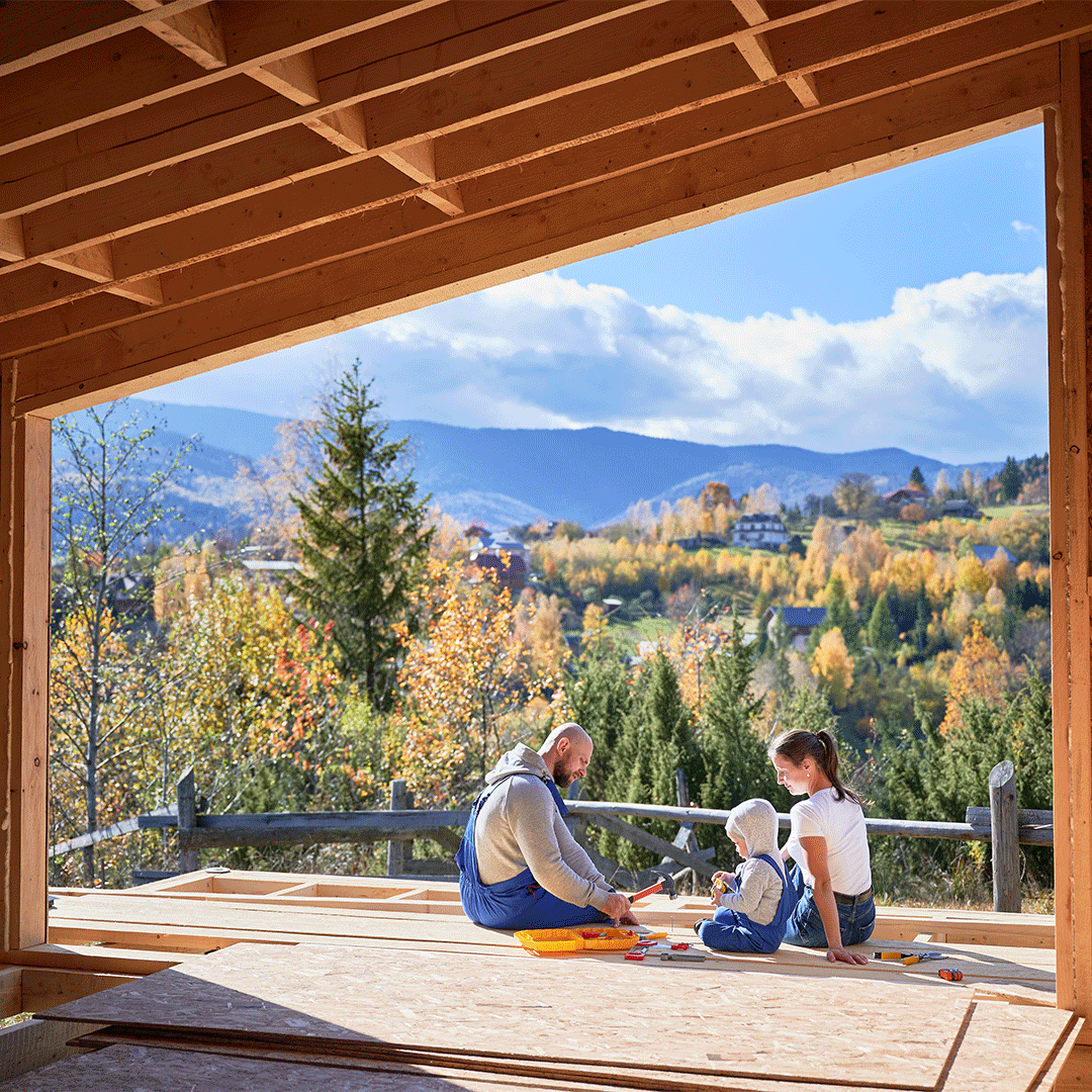 father-mother-and-son-building-wooden-house